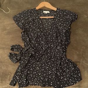 Black and white ruffled, wrap shirt